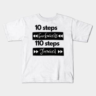 10 steps backwards 110 steps forward Kids T-Shirt